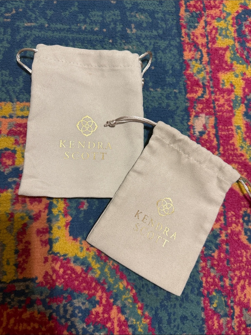 Kendra Scott Drawstring Jewelry Pouch in Light Cream with Gold Logo